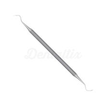 Curette de McCall : Instrument parodontal pour l’élimination du tartre